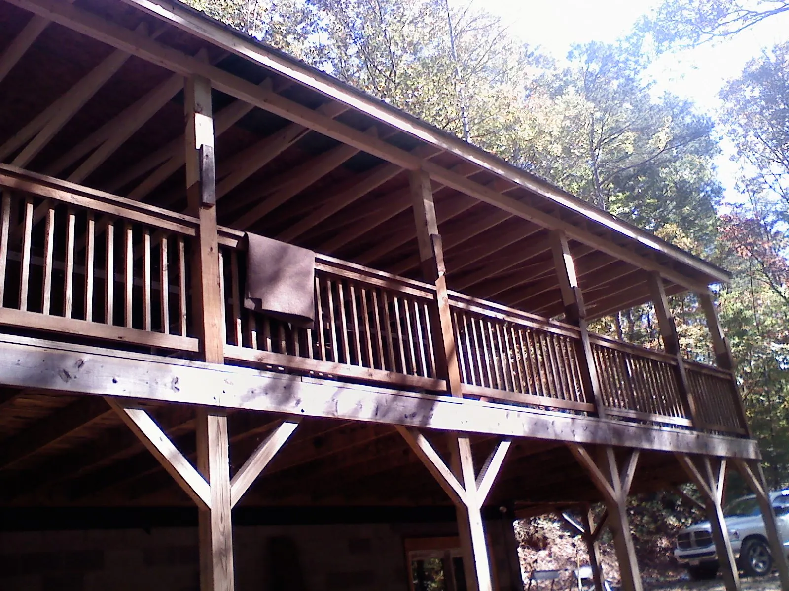 Timber framing under a new elevated porch and deck — Roof Leak Repair in New Fairfield by Roofing Brothers